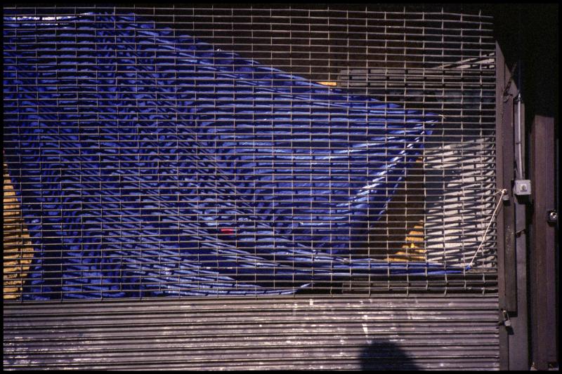 Gate and Blue Tarp